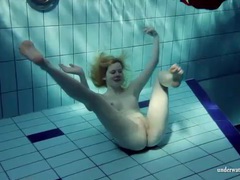 KiloPanties presents: Blonde goes for a swim and strips