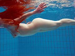 KiloPanties presents: Redhead simonna showing her body underwater