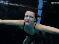 KiloPanties presents: Beautiful girl swims and smiles underwater