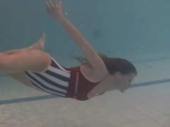 KiloPanties presents: Leggy girl swims and strips naked in pool