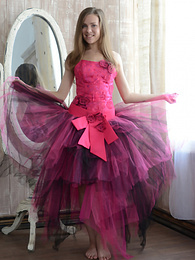 KiloPanties presents: Gorgeous teen cutie stripping an evening dress and showing body in front of a big mirror.