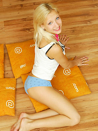 KiloPanties presents: Amazing blonde nude teen decided to place herself at the attic of her wooden house on four orange pillows for her dirty intention.