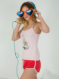 KiloPanties presents: This doll really knows how to have fun with her and how she can show off her pussy and listen to some beats at the same time.