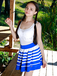 KiloPanties presents: Fresh-Faced russian beauty Mia Grandy gets totally naked on a picnic table in a garden